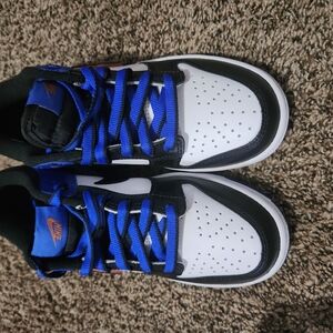 Nike Black and Blue Sneakers with Classic Silhouette